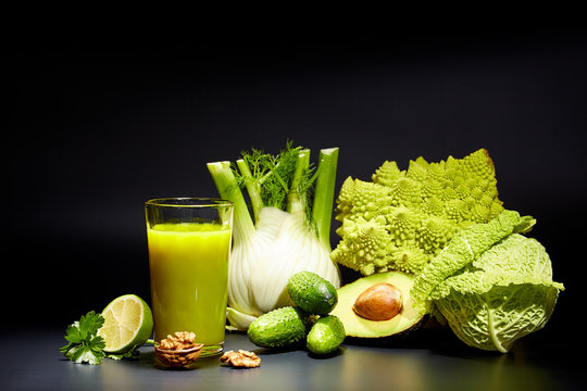 healthy vegetable juices for refreshment and as an antioxidant . Black background