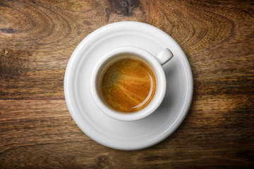 isolated coffee cup top view on wooden background