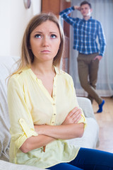 Young husband blaming girl during quarrelling