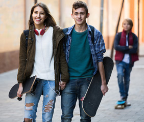 teen and his friends after conflict outdoors