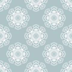 Floral vector light blue and white ornament. Seamless abstract classic pattern with flowers