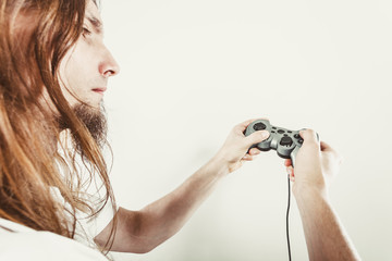 Unhappy male playing games