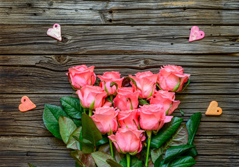 Roses at center of background with little hearts