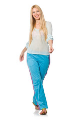 Young woman wearing blue training pants isolated on white