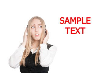 Closeup portrait of a worried customer service representative or young business woman, speaking on hands free phone, with copyspace (isolated on white background)