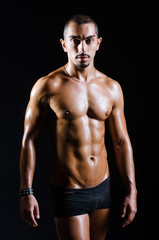 Fototapeta na wymiar Ripped muscular man in sports concept
