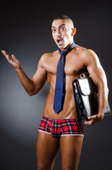 Ripped young man in studio concept