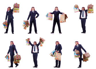Obraz premium Arab man with shopping gifts on white
