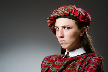 Woman wearing traditional scottish clothing