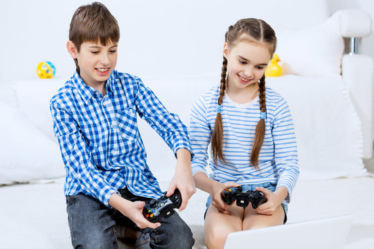 Kids playing game console