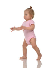 Infant child baby girl kid toddler in pink body cloth make first