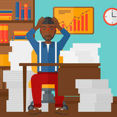 Man in despair sitting in office.