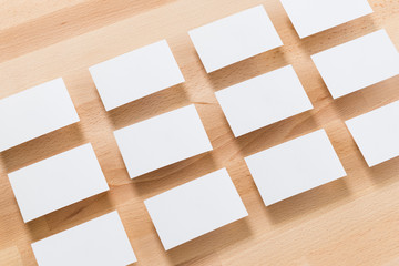 Business card blank on wood background