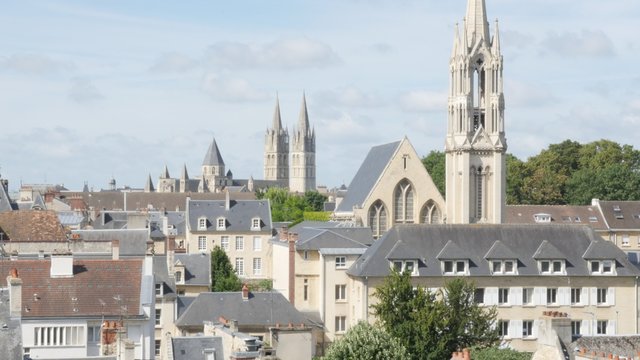 City of Caen located in northern French region Normandy 4K 3840X2160 UltraHD footage - Tilting over cityscape of Calvados capital Caen in France 4K 2160p UHD video 