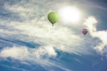 Colorful hot air balloon high in the sky