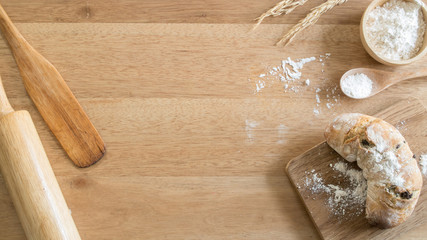 Fototapeta na wymiar Breakfast, Fresh homemade whole wheat bread on the wooden chopping board
