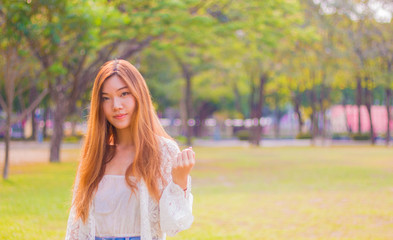 Portrait of a beautiful young Asian woman outdoor