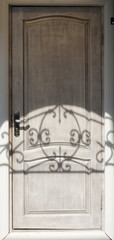 Fototapeta premium Entrance door with a shadow