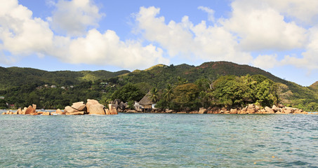 Island and hotel Chauve Souris Club in the Indian Ocean