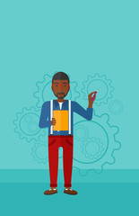 Man standing on gears background.