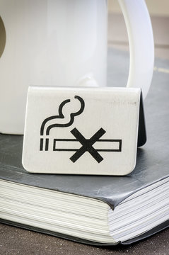 NO Smoking sign on the  book