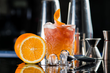 Fresh cocktail with orange and ice. Alcoholic, non-alcoholic dri