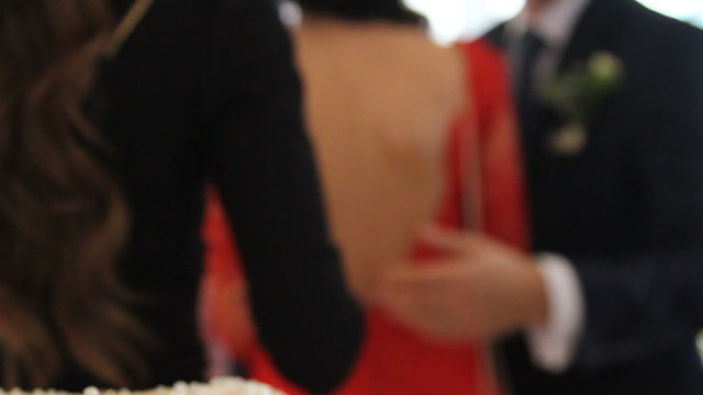 People congratulate newlyweds