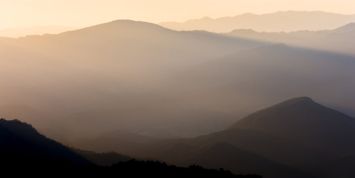 Silhouette Of Mountain Layer In Morning Sunset Afternoon Sunshin