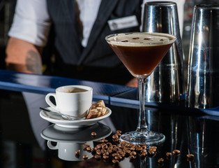 Fresh coffee cocktail with coffee beans and espresso at the bar