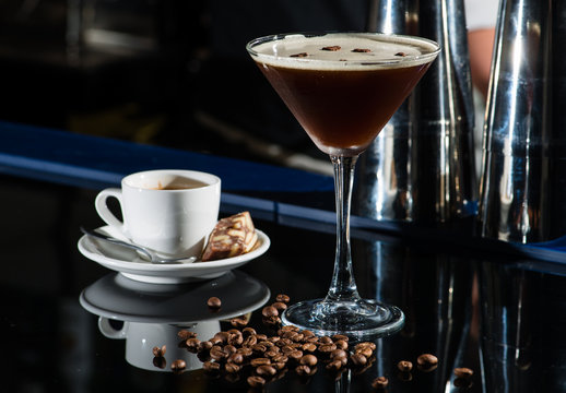 Fresh coffee cocktail with coffee beans and espresso at the bar