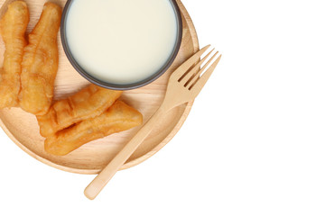 soybean milk and fried doughstick on wood plate