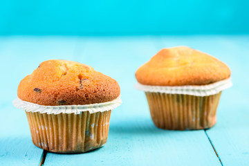Chocolate Chip Muffins On Blue Table