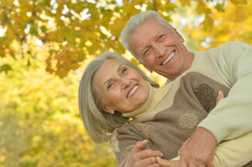 Senior couple in autumn park