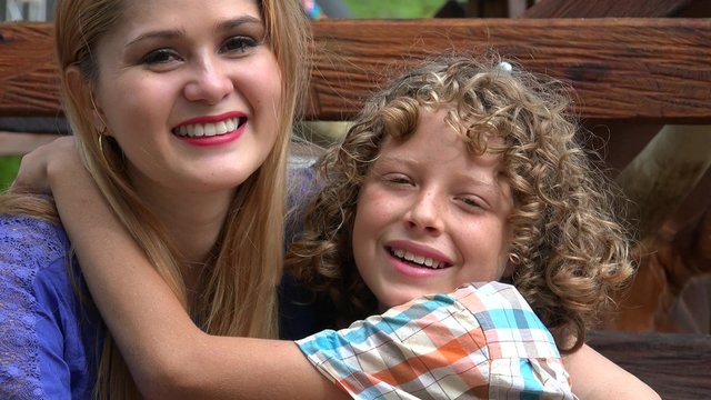 Young Brother Kisses Sister