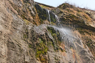 High waterfall on a cliff