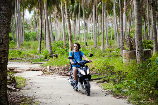 the guy rides a motorbike