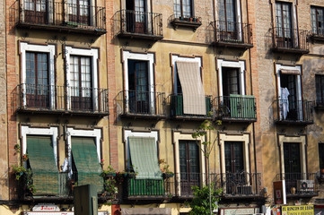 Fototapeta na wymiar French-window pattern with balconys in Spain