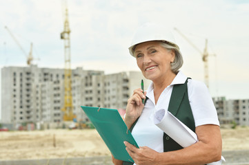 senior  woman  in under construction
