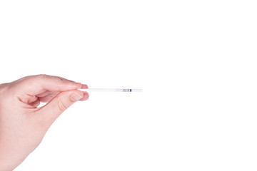 Holding pregnancy test isolated on white background.