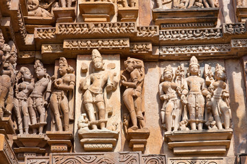 Bas-relief at famous ancient temple in Khajuraho, India