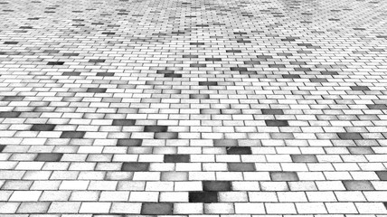 Perspective View of Monotone Black and White Brick Stone Street Road. Sidewalk, Pavement Texture Background with Abstract Gray Wall for Interior Design