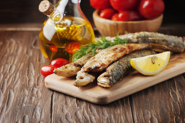 Traditional russian fish smelt on the wooden table