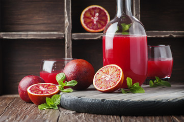 Sweet juice with red oranges and mint