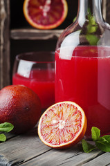 Sweet juice with bloody oranges and mint