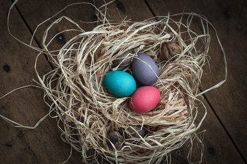 straw nest with eggs