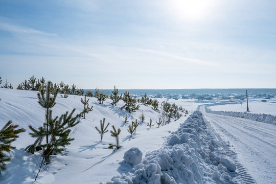 Image of road to village in wintertime