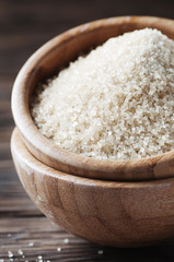 Brown sweet sugar on the wooden table