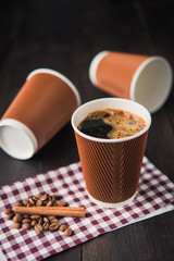 paper cup of hot coffee