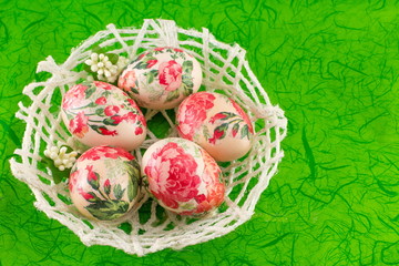 Decorated Easter eggs in a basket