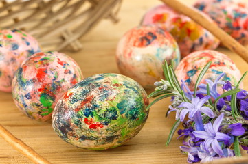 Painted Easter eggs falling out of basket